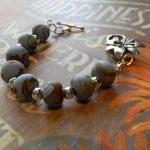 - Handcrafted Beaded Polymer Clay Bracelet