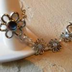- Flower Ring/ Bracelet And Swarovski Crystals