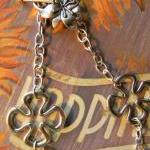 - Flower/cross Silver Necklace With Button..