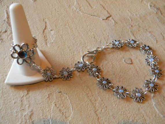 - Flower Ring/ Bracelet And Swarovski Crystals